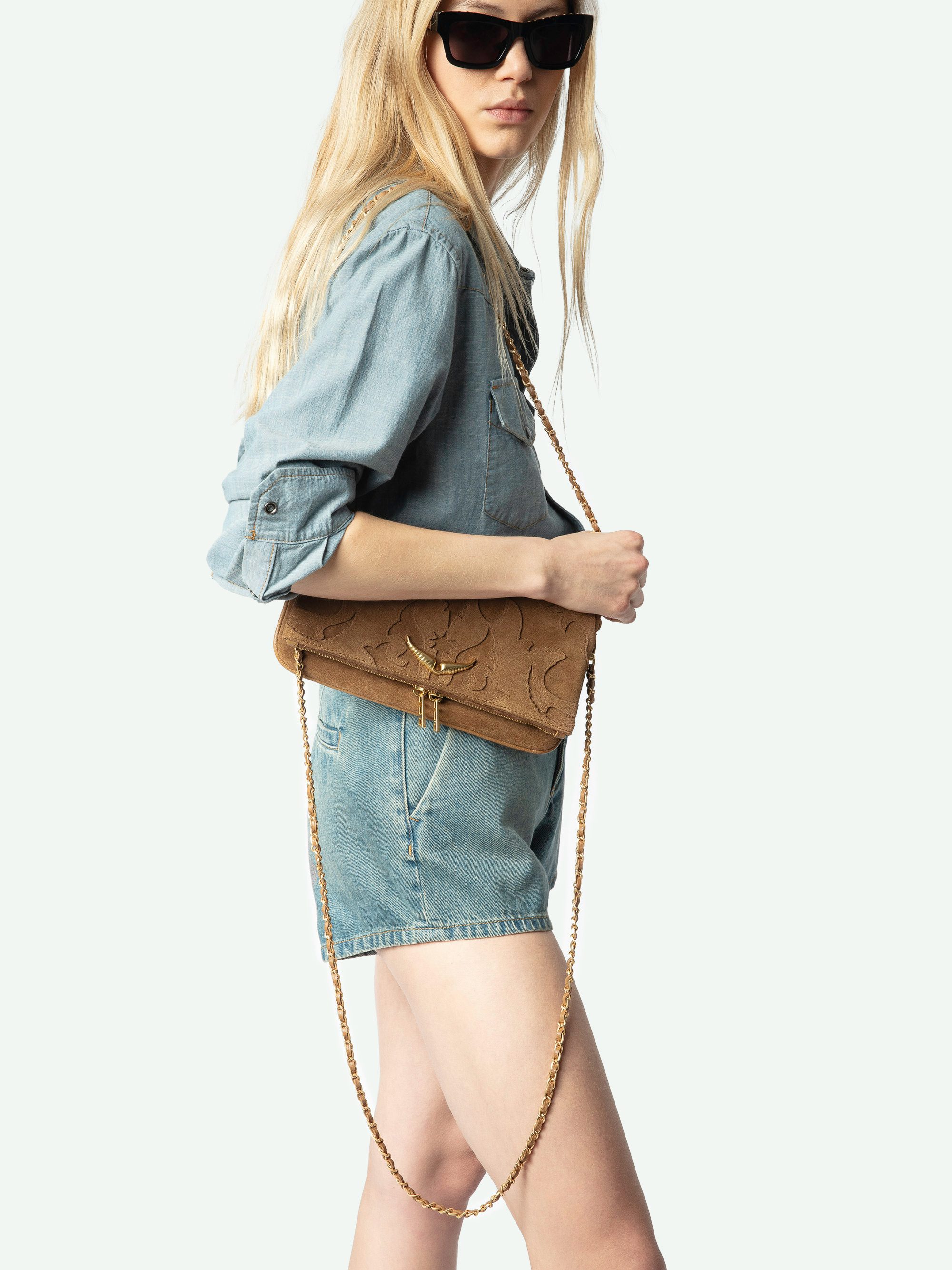 Rock Suede Clutch - Western suede leather clutch with double chain and wing signatures.